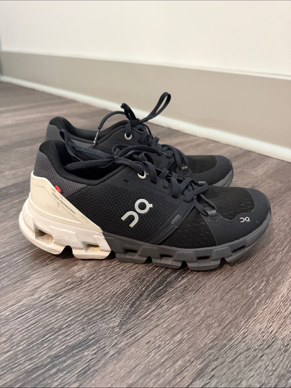 On Running Cloudace Men’s Black with White Heel Athletic Shoes